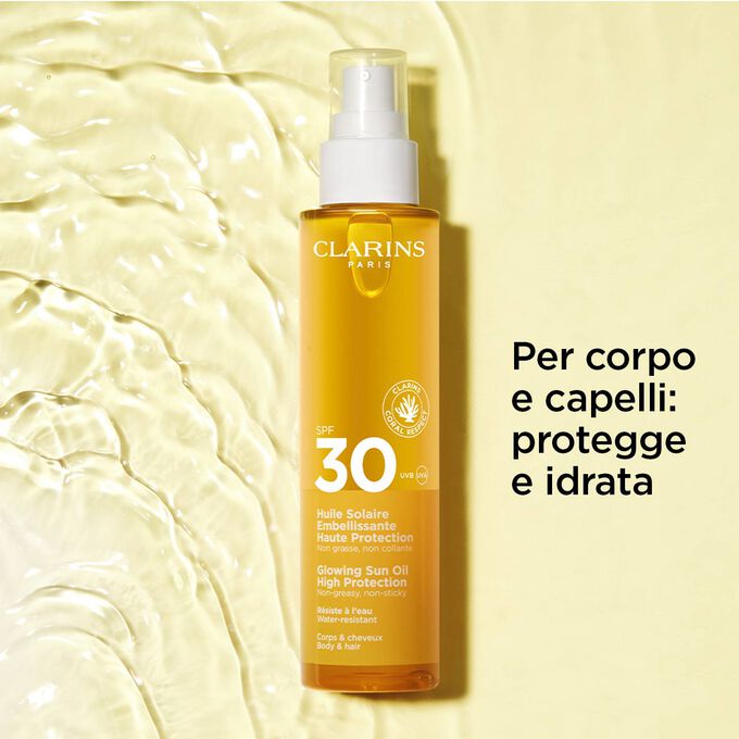 Packshot su sfondo texturizzato di olio solare spray 30+ per capelli e corpo con testo sull'azione protettiva e nutriente