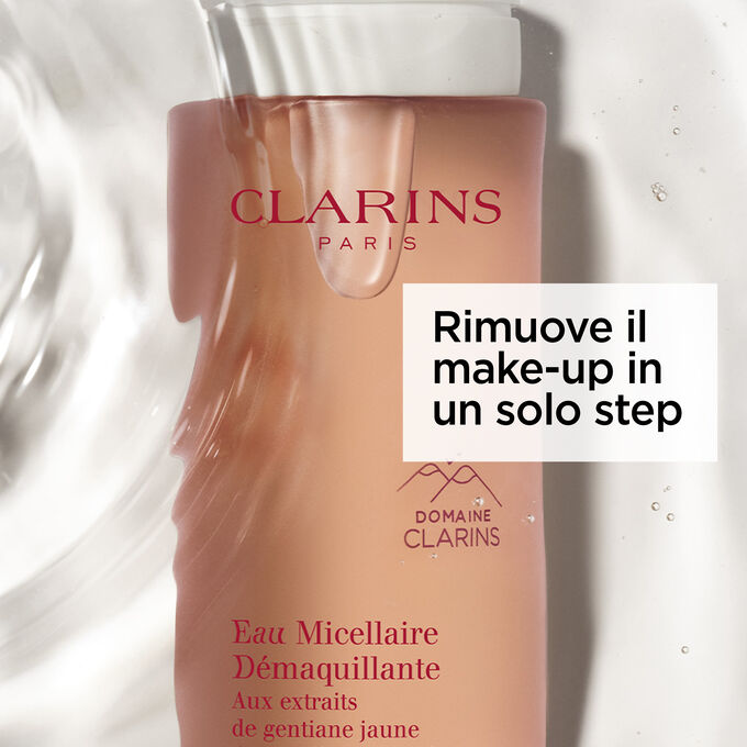 Immagine del prodotto in un flacone arancione-rosa di acqua micellare, con testo capacità di rimuovere rapidamente il make-up